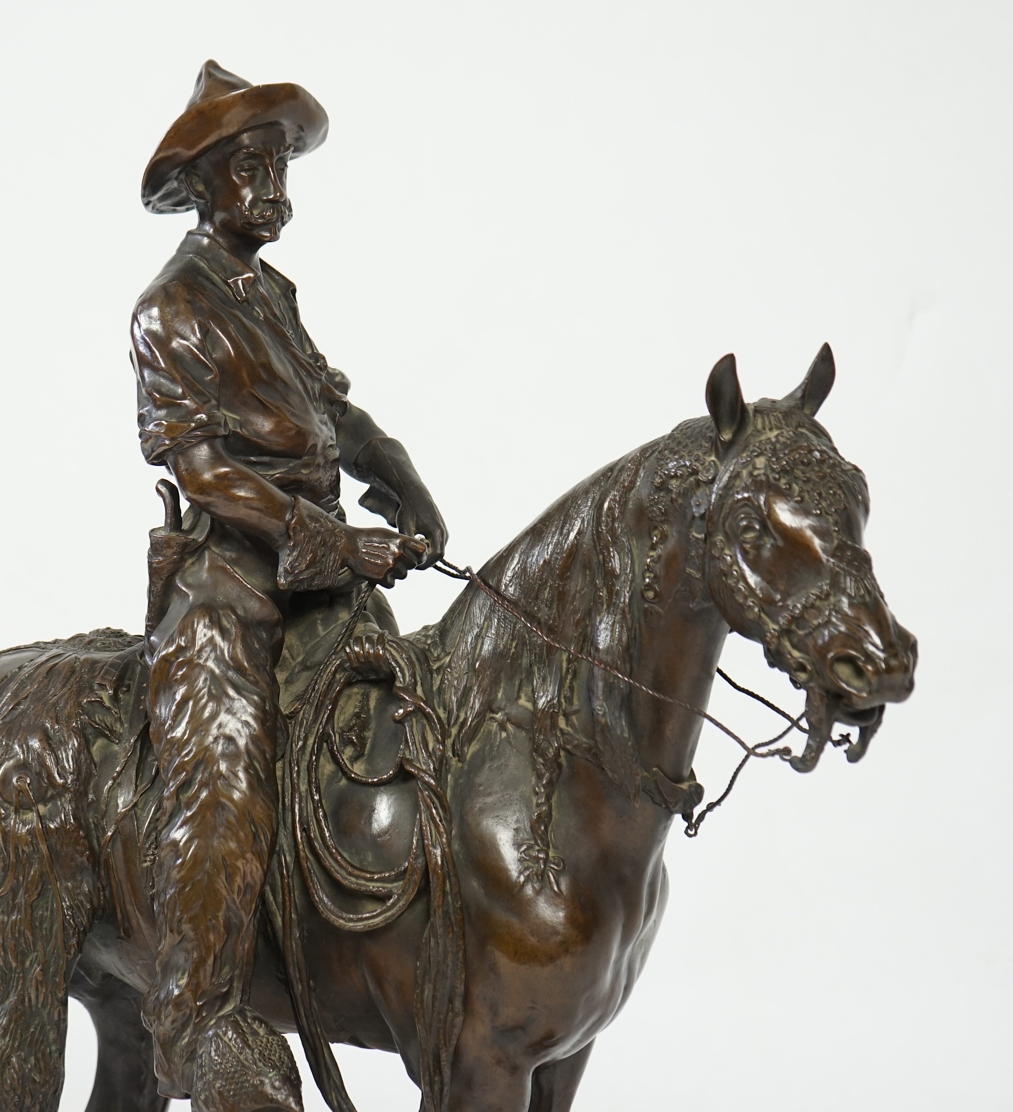Walter Winans (St. Petersburg, 1852-Parsloe Park, Essex, 1920), a cast bronze of the artist, as a cowboy, riding the Arab stallion Skowronek, 50cm wide, 66cm high, overall 79.5cm high